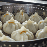 Ukadiche Modak Recipe in Marathi – गणपतीसाठी उकडीचे मोदक बनवताना